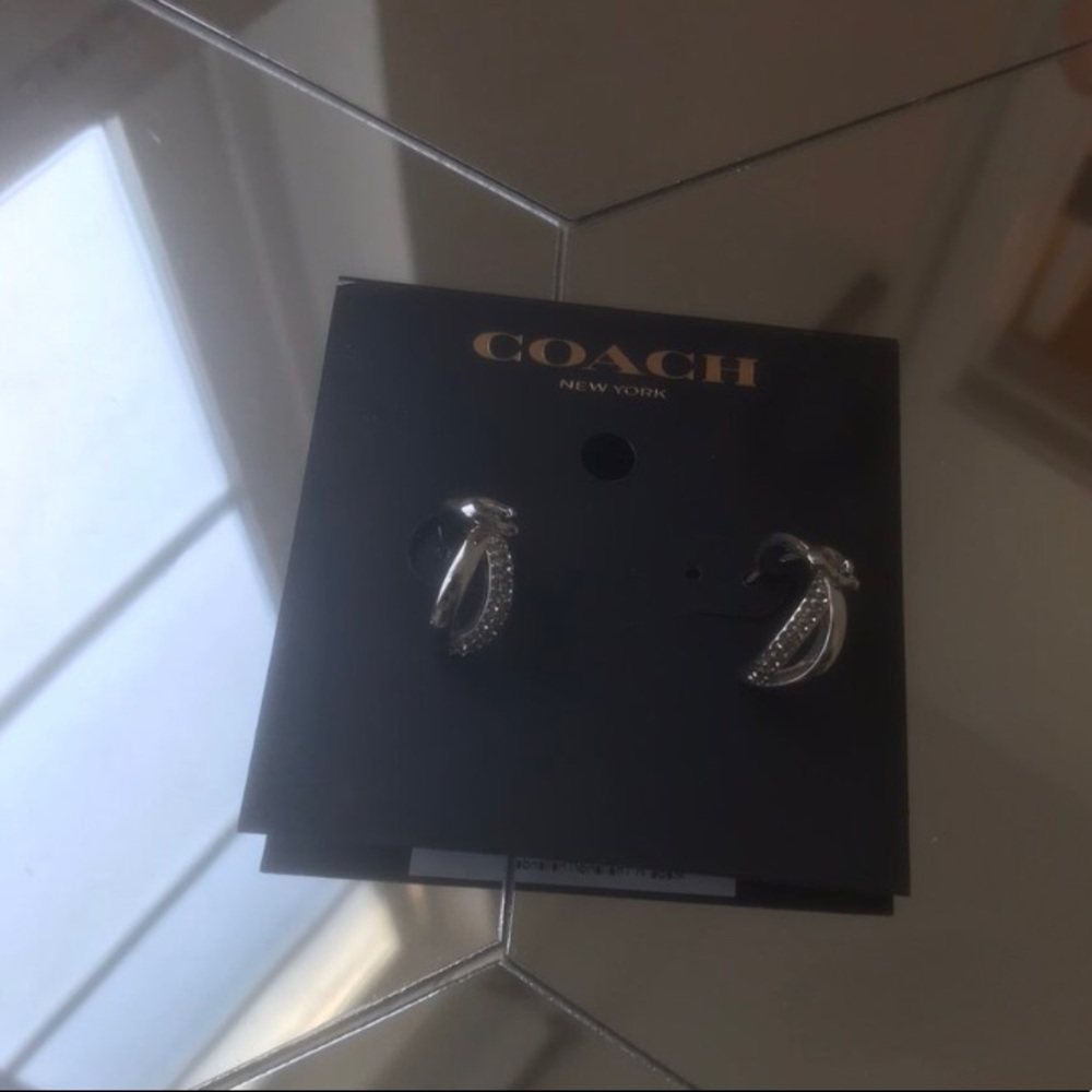 silver coach earrings